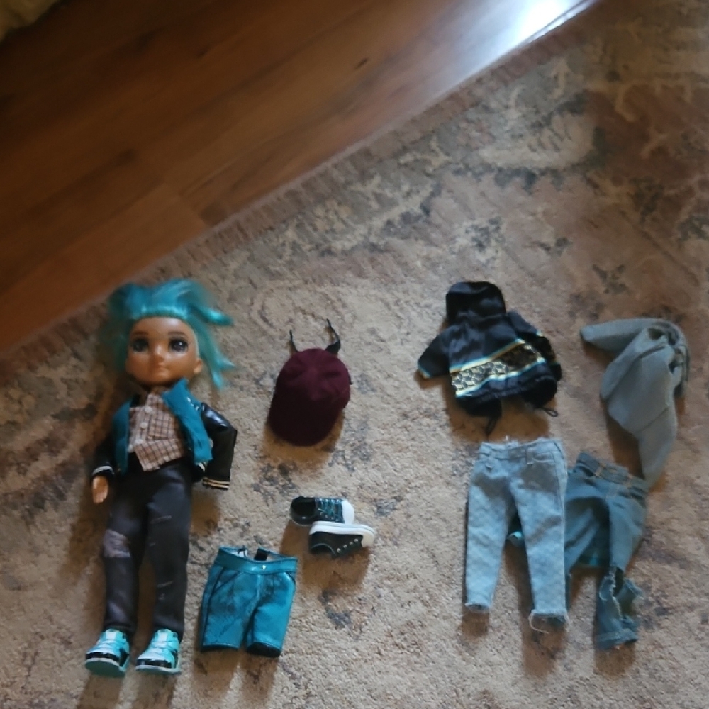 Stylish Doll with Blue Hair and Trendy Outfits